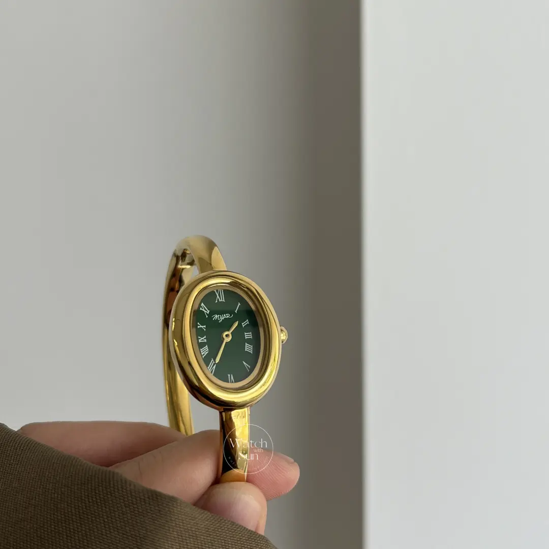 Vintage-Inspired Emerald Green Dial Oval Bangle Watch for Women
