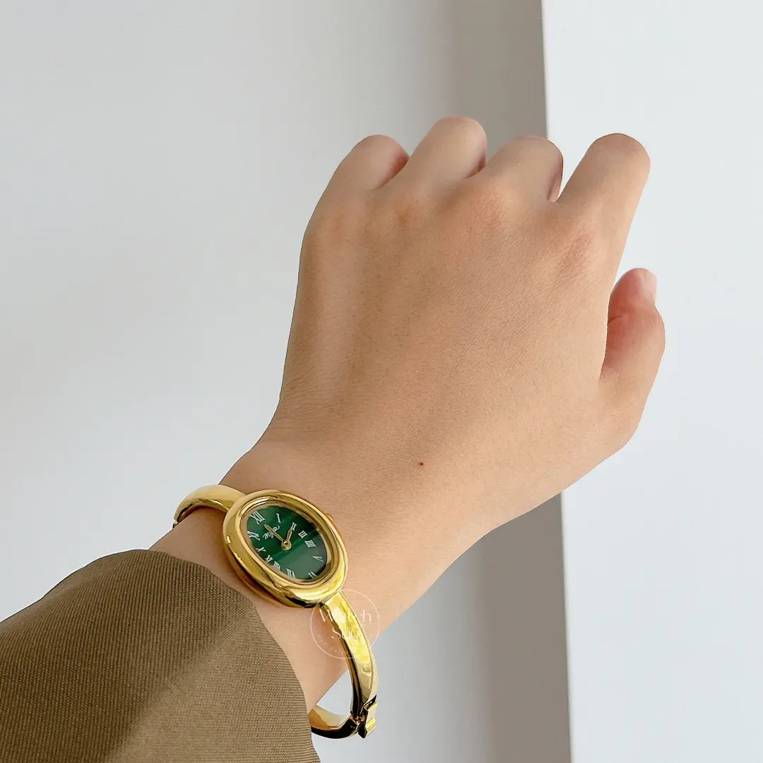 Vintage-Inspired Emerald Green Dial Oval Bangle Watch for Women