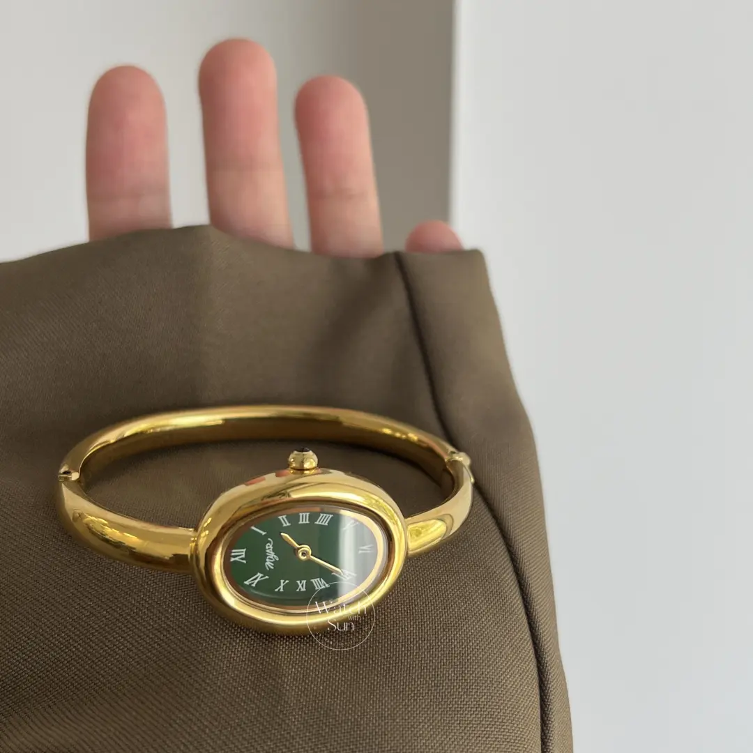 Vintage-Inspired Emerald Green Dial Oval Bangle Watch for Women