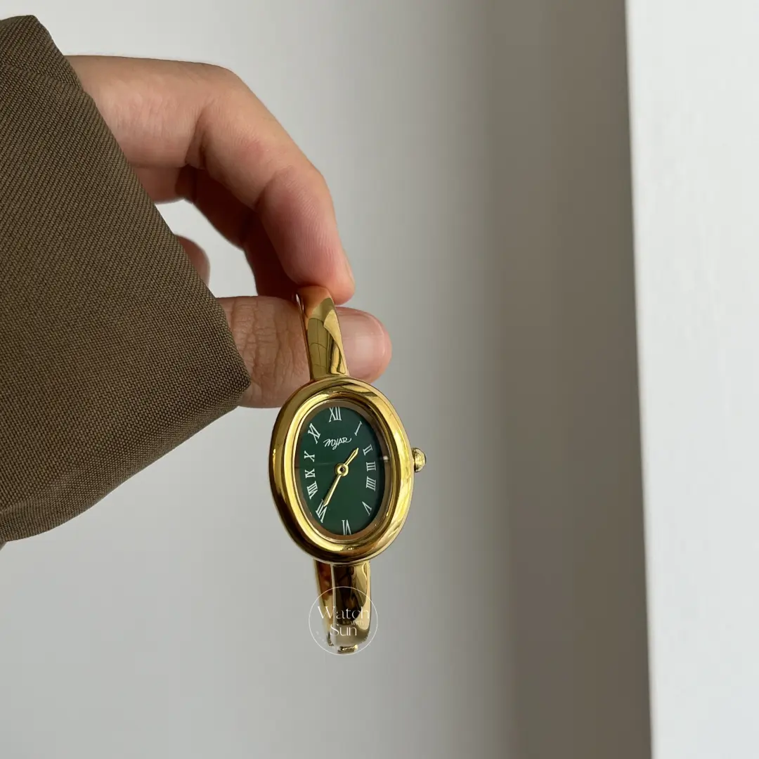 Vintage-Inspired Emerald Green Dial Oval Bangle Watch for Women