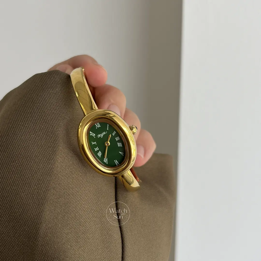 Vintage-Inspired Emerald Green Dial Oval Bangle Watch for Women