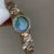 Chic Round Face Gold Bracelet Watch Blue Mother-of-Pearl Dial Ladies Watch