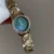 Chic Round Face Gold Bracelet Watch Blue Mother-of-Pearl Dial Ladies Watch