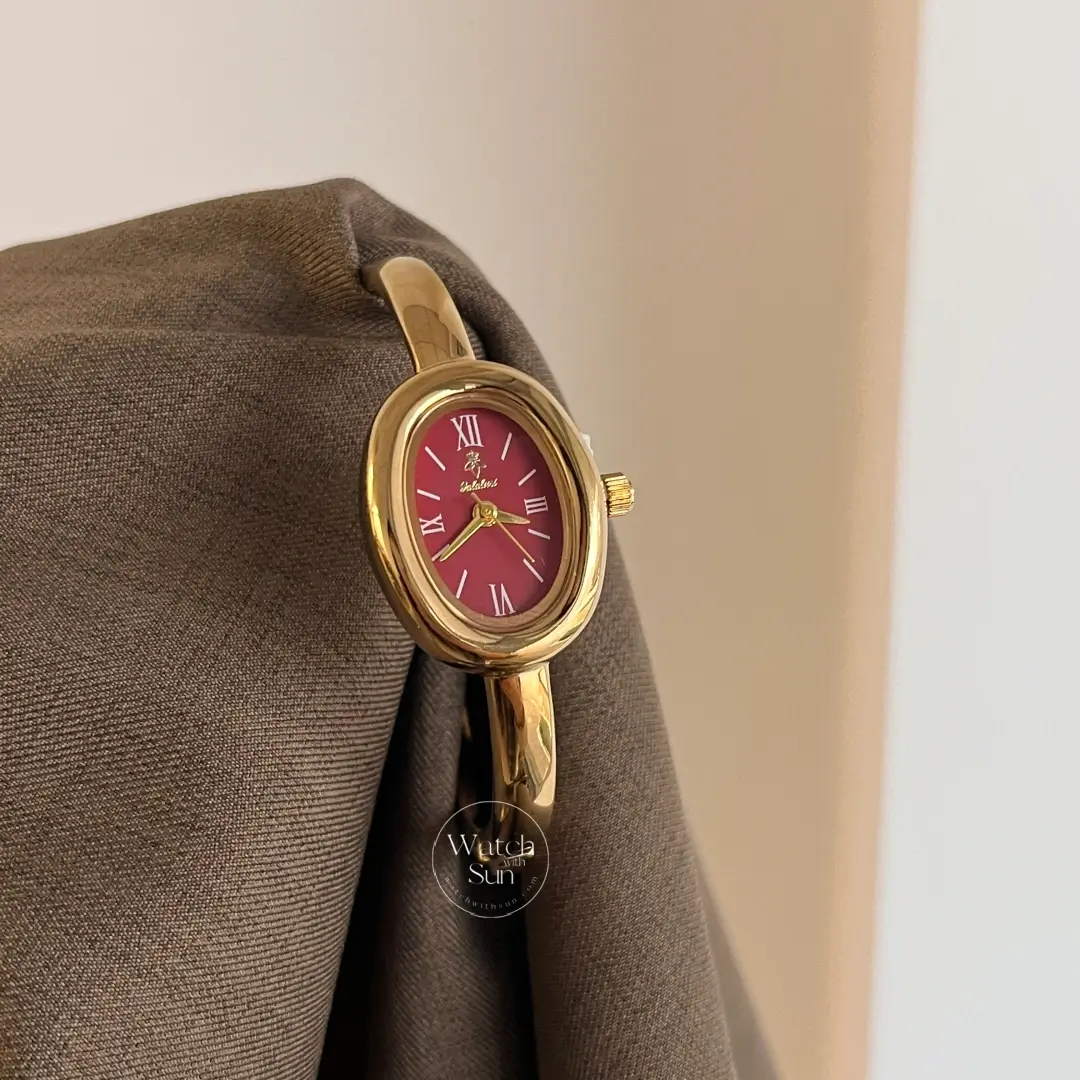 Chic Oval Burgundy Dial Gold Bangle Ladies Watch