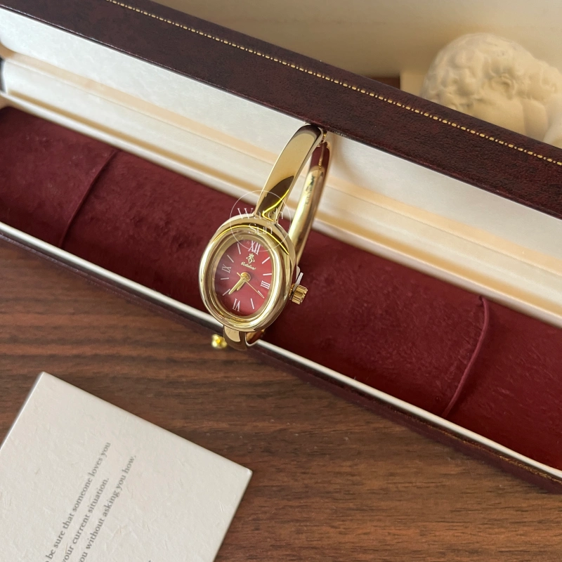 N759-2 Chic Oval Burgundy Dial Gold Bangle Ladies Watch