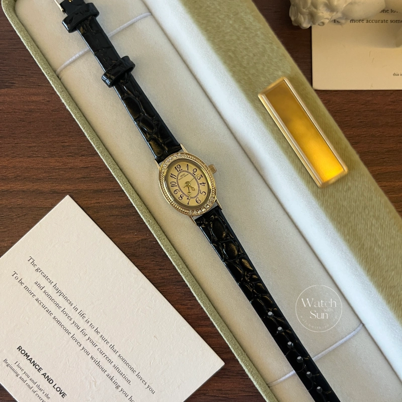 Dainty Gold Oval Dial Black Genuine Leather Strap Ladies Watch