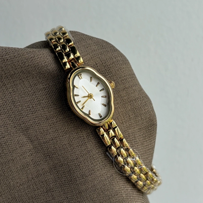 WWS 812-5 (1) (1) Retro Golden Oval flower Dial Metal Bracelet Women's Watch