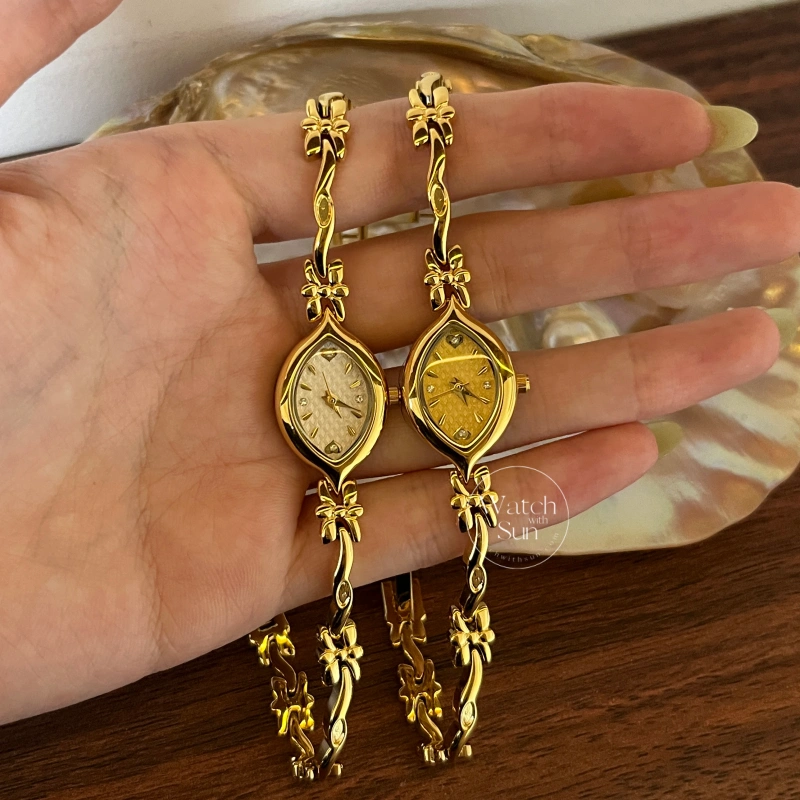 Dainty Gold/White Marquise Dial Floral Twist Bracelet Women‘s Watch