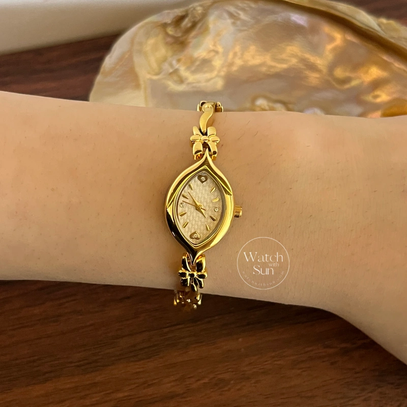 Dainty Gold/White Marquise Dial Floral Twist Bracelet Women‘s Watch