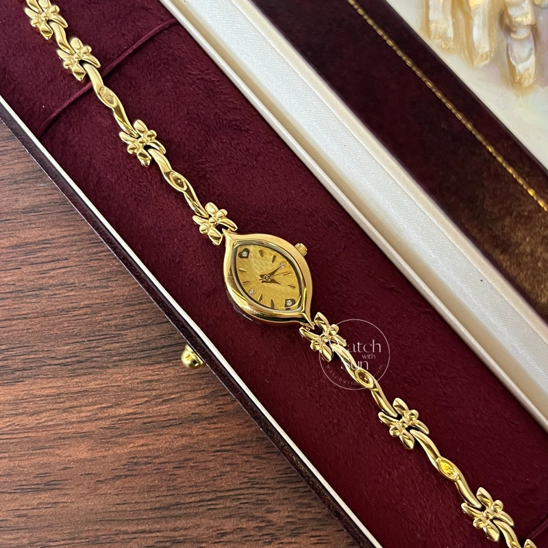 Dainty Gold/White Marquise Dial Floral Twist Bracelet Women‘s Watch