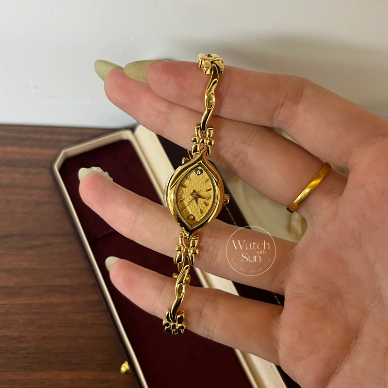 Dainty Gold/White Marquise Dial Floral Twist Bracelet Women‘s Watch