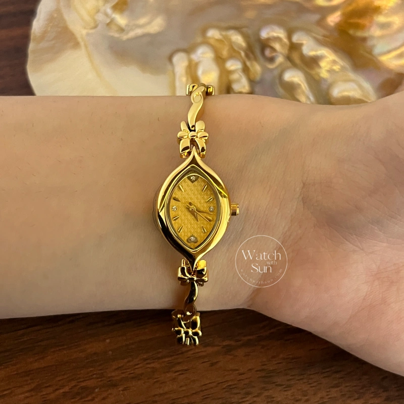 Dainty Gold/White Marquise Dial Floral Twist Bracelet Women‘s Watch