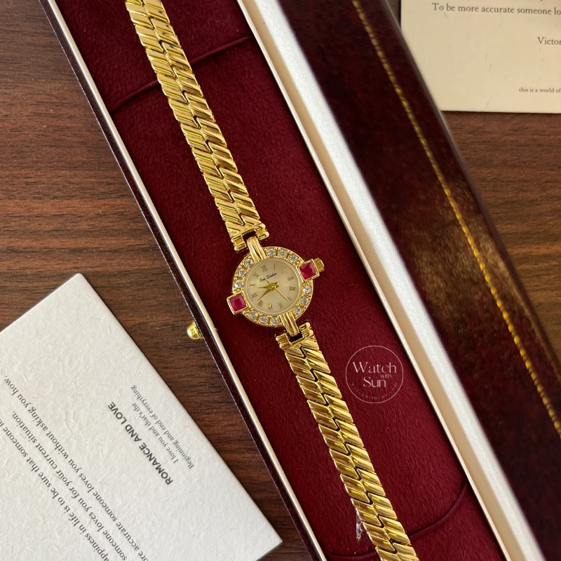N776-2 Vintage-Inspired Ruby Crystal Dial Gold Bracelet Ladies Watch
