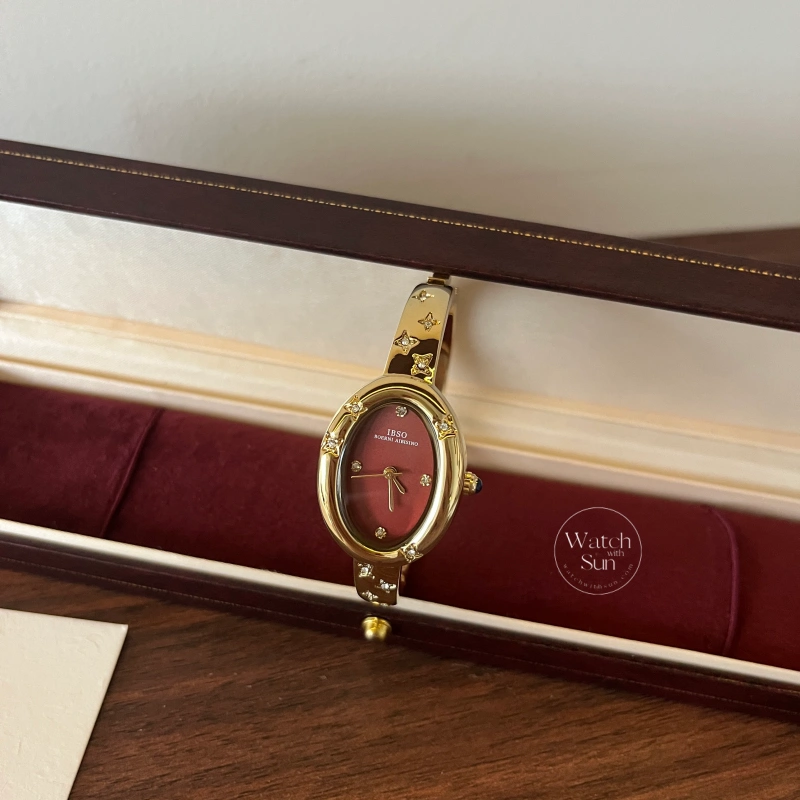 Elegant Gold Oval Red Dial Zircon Bangle Watch for Women