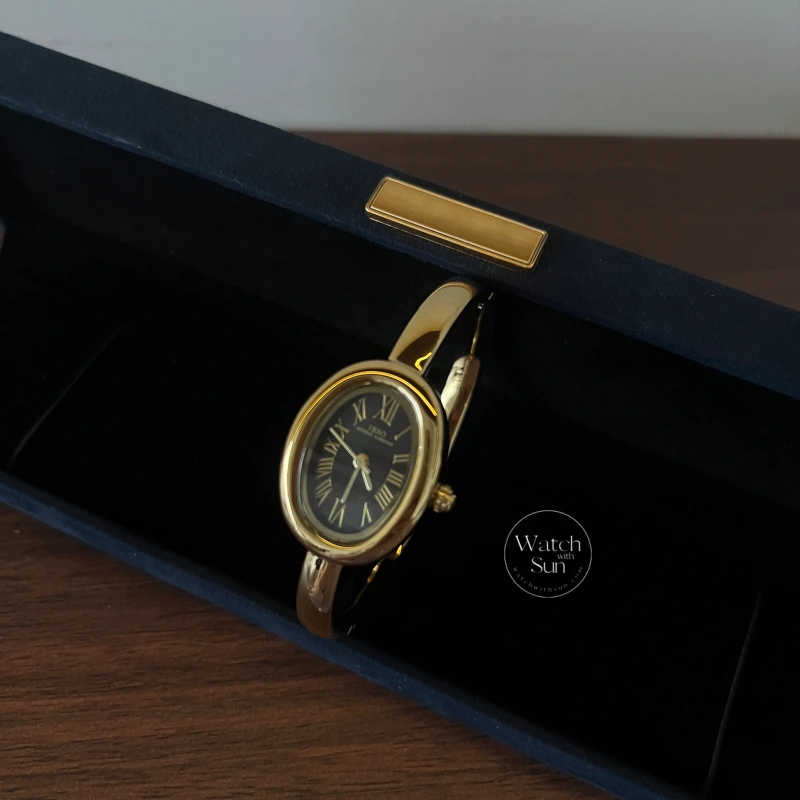 Classic Gold Oval Black Roman Numeral Bangle Watch for Women