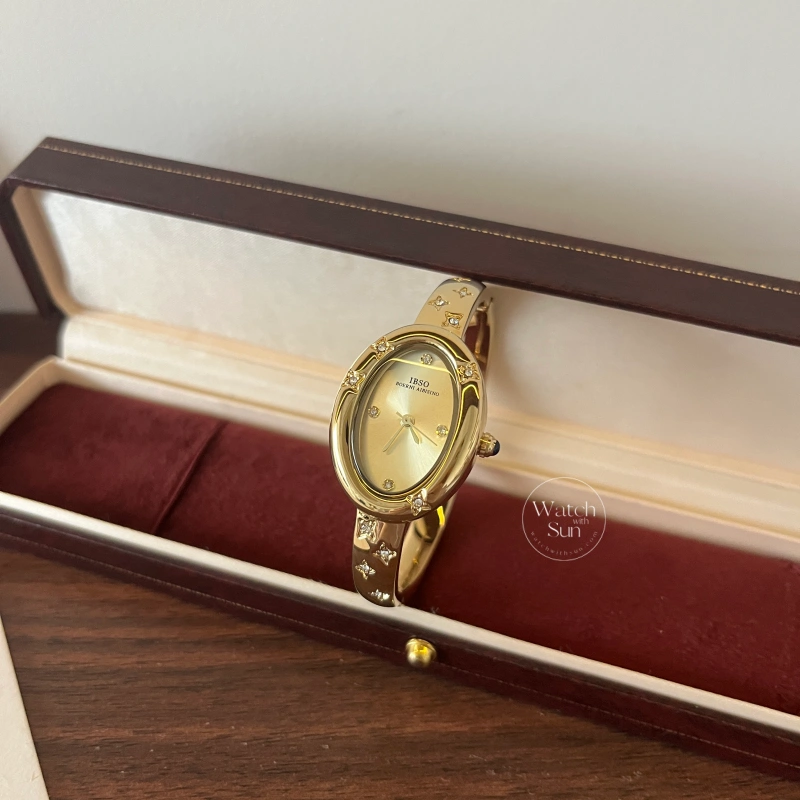 Elegant Gold Oval Dial Zircon Bangle Watch for Women