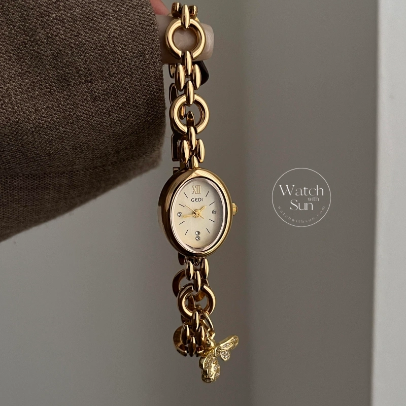 Elegant Gold Oval Bee Charm Bracelet Watch, Cream Dial Chain Link Wristwatc