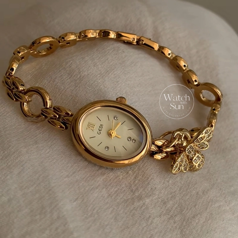 Elegant Gold Oval Bee Charm Bracelet Watch, Cream Dial Chain Link Wristwatc