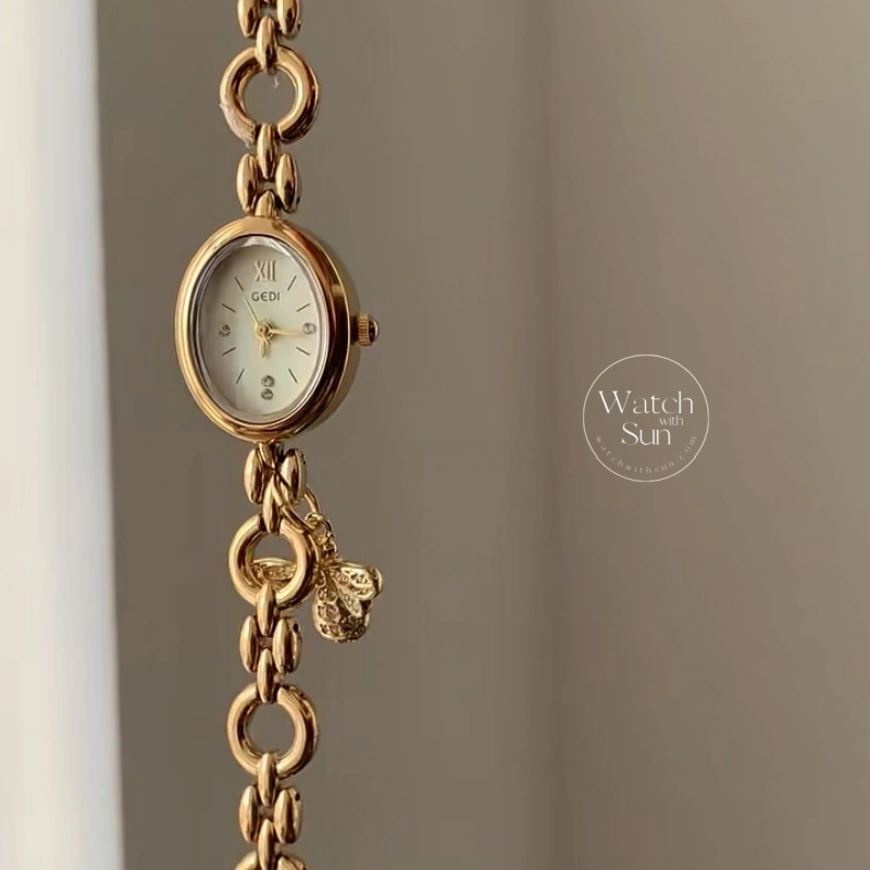 Elegant Gold Oval Bee Charm Bracelet Watch, Cream Dial Chain Link Wristwatc