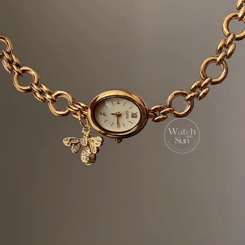 Elegant Gold Oval Bee Charm Bracelet Watch, Cream Dial Chain Link Wristwatc