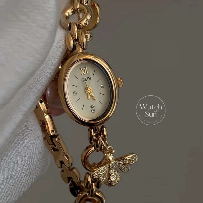 Elegant Gold Oval Bee Charm Bracelet Watch, Cream Dial Chain Link Wristwatc